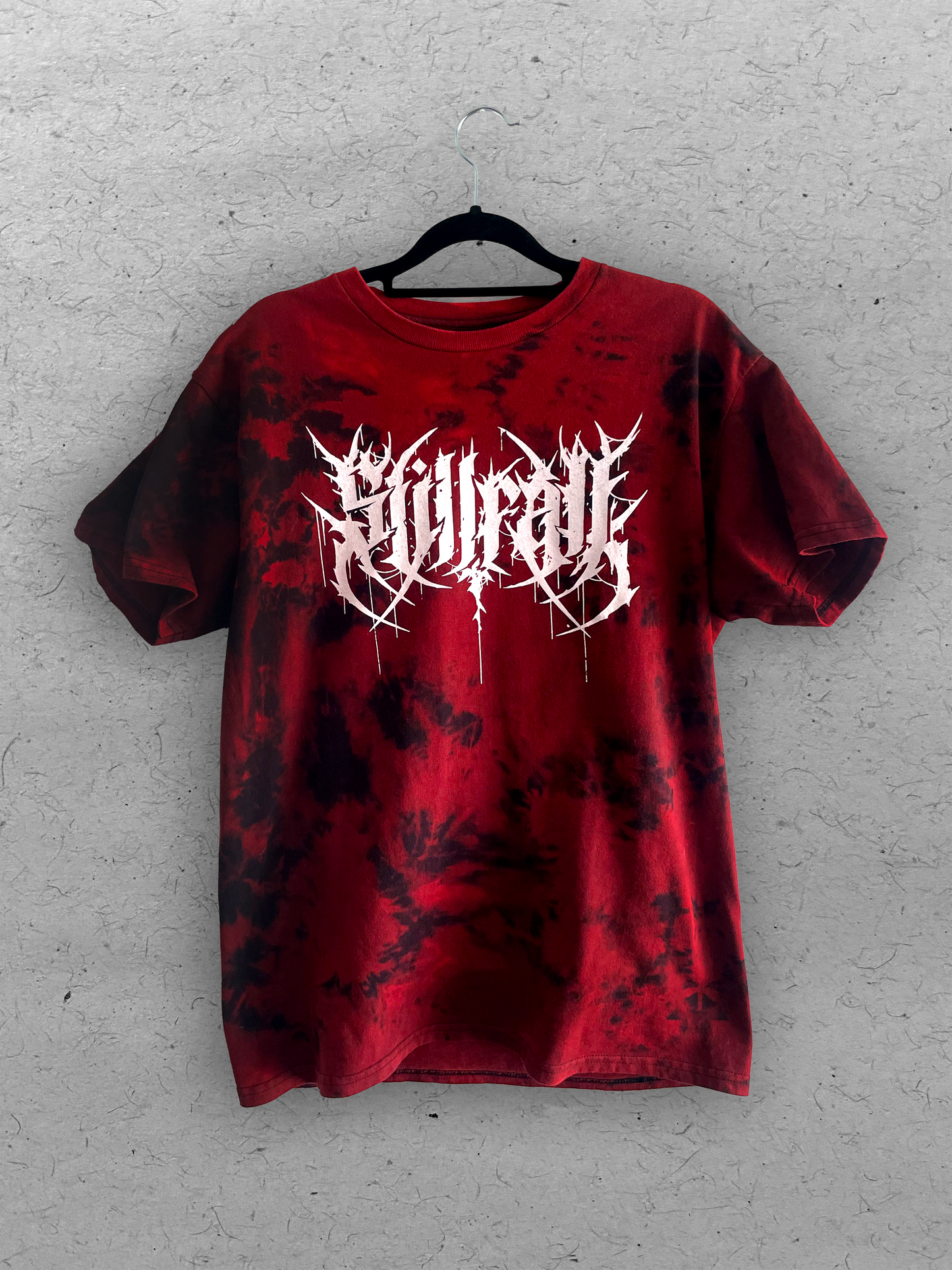 Red & black tie-dye shirt featuring a white Stillfall logo