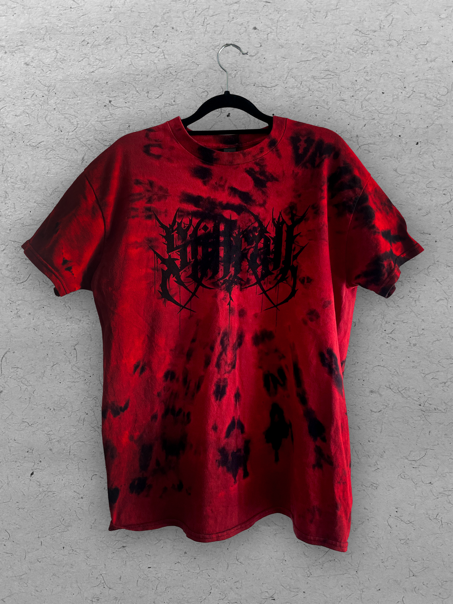 Red & black tie-dye shirt featuring a black Stillfall logo